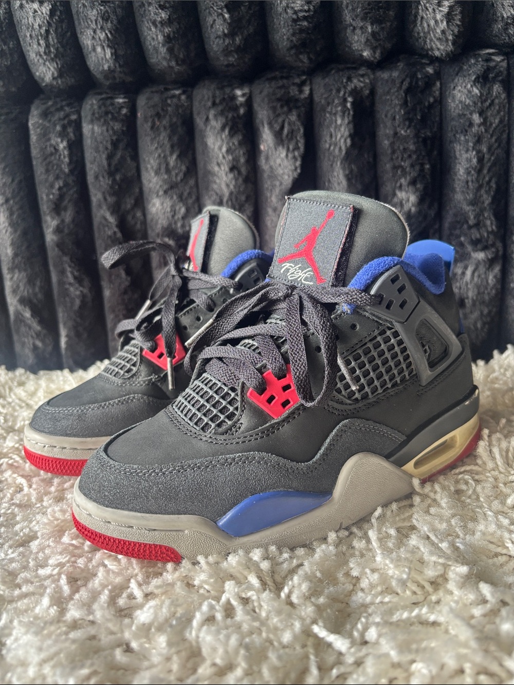 Jordan Kids' Sneakers in Black with Red and Royal Blue Accents